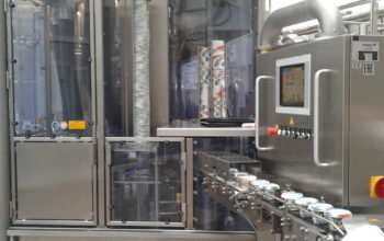Очередной запуск автоматической машины для наполнения и запечатывания стаканчиков  GRUNWALD-HITTPAC AKH-059